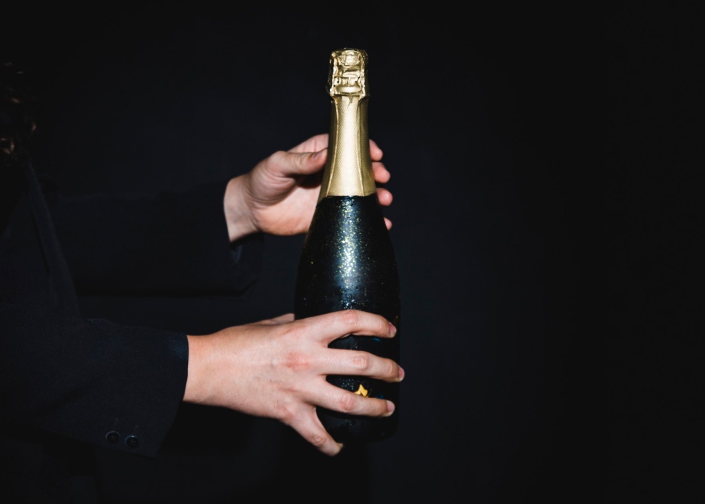man-holding-bottle-champagne (1).jpg