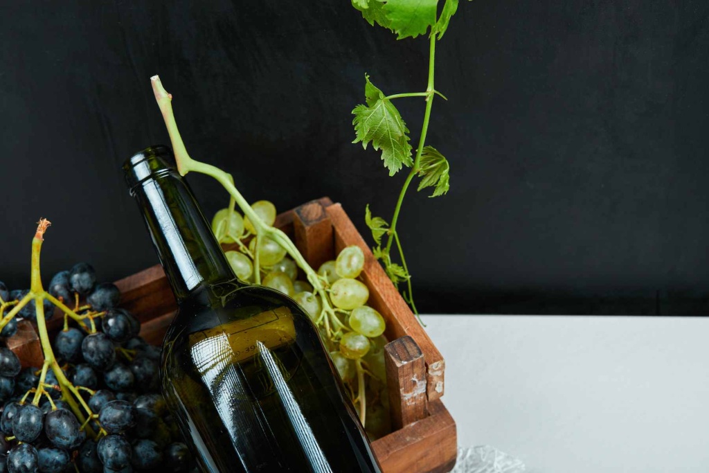 bunch-grapes-wine-bottle-white-table-high-quality-photo (1).jpg